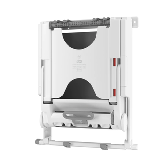 The Tork PeakServe ZZ manual paper towel dispenser is a small white plastic.