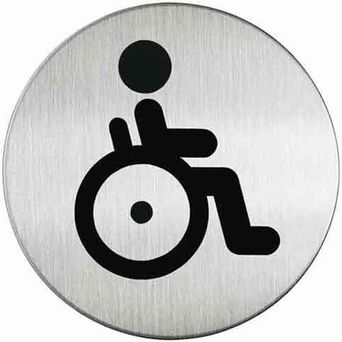 Označenie toalety pre zdravotne postihnutých je kovové a okrúhle.