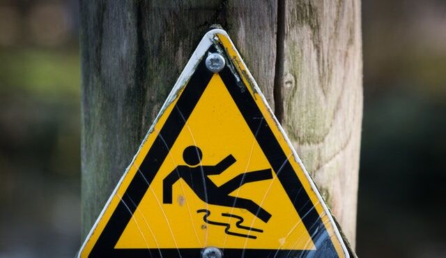 How to place warning signs in public utility facilities?